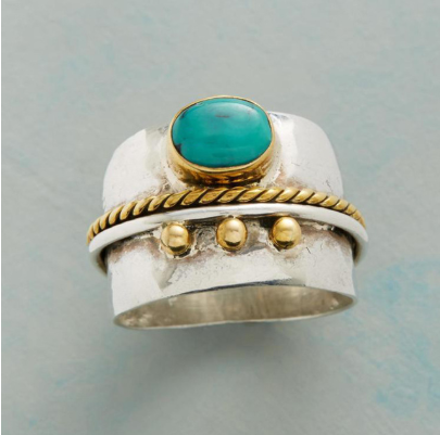S-shaped blue black gold horse eye ring
