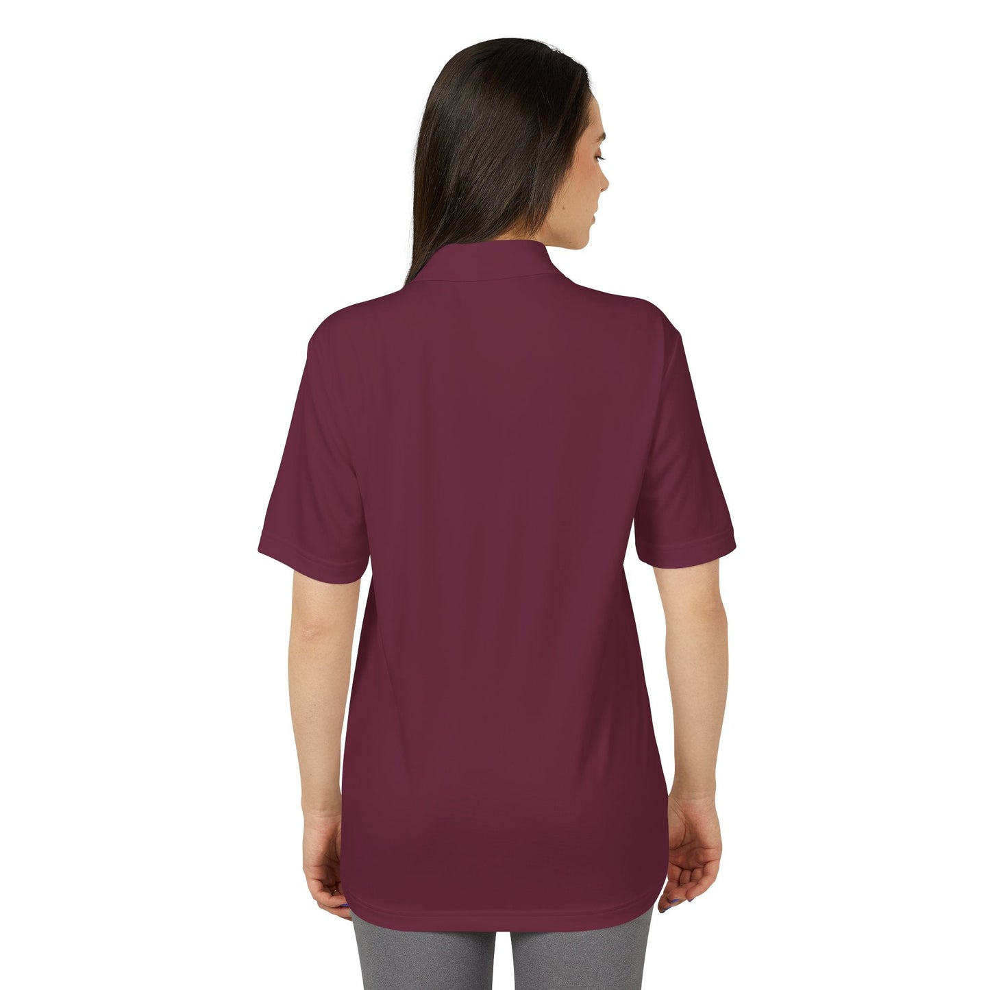 Motivation Is a Universal Language Polo — Unisex Performance Polo
