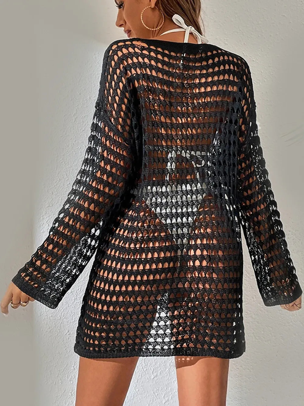 Knitted hollowed out pullover round neck long sleeved bikini swimsuit cover