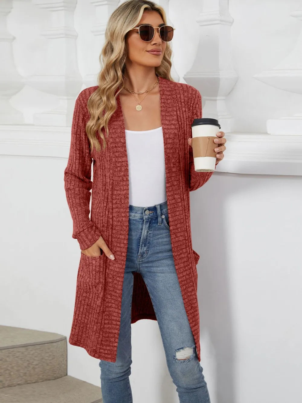 Autumn and winter long color long sleeved loose pocket cardigan jacket for women
